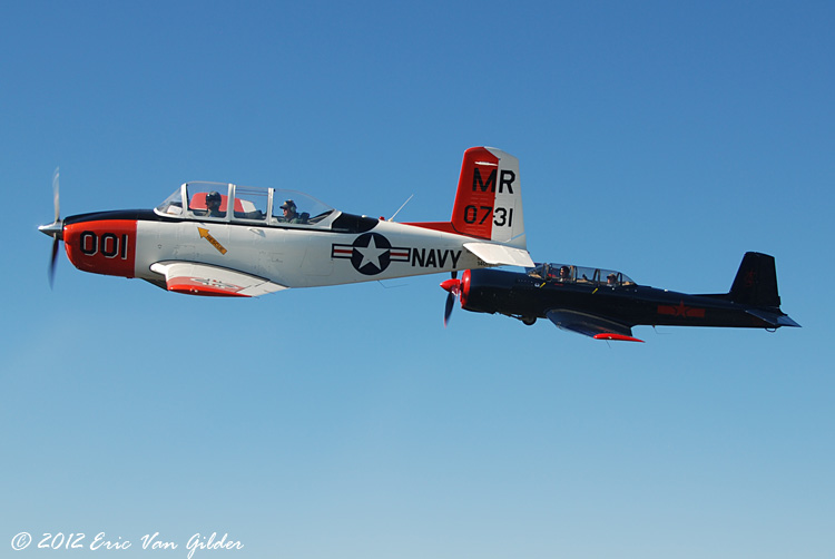 Marc Russell in his T-34 Mentor and Ron Lee in his
            Nanchang CJ-6A