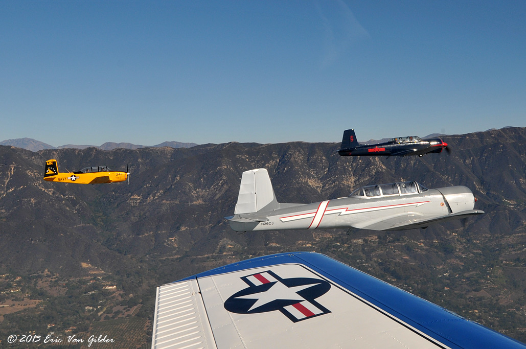 Ron Lee in his Nanchang CJ-6A leading Terry
            Norbraten, Gil Lipaz and Ron Alldredge.