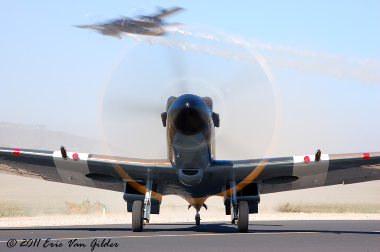 Tigercat pass over Spitfire