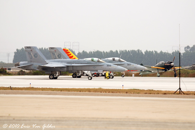 F-18s, firecat jet and Zero parked on the hot ramp