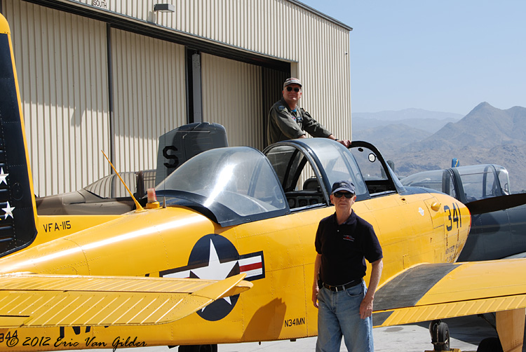 Terry Norbraten and his dad, Richard awaiting their turn to get pushed into the hangar
