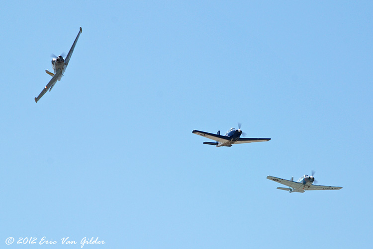Todd
              McCutchan, George Wilen and Dick Stich, "Alpha"
              flight breaking over the field