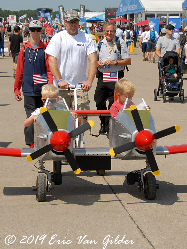 Airplane themed pedal
            pushcart of a P-82